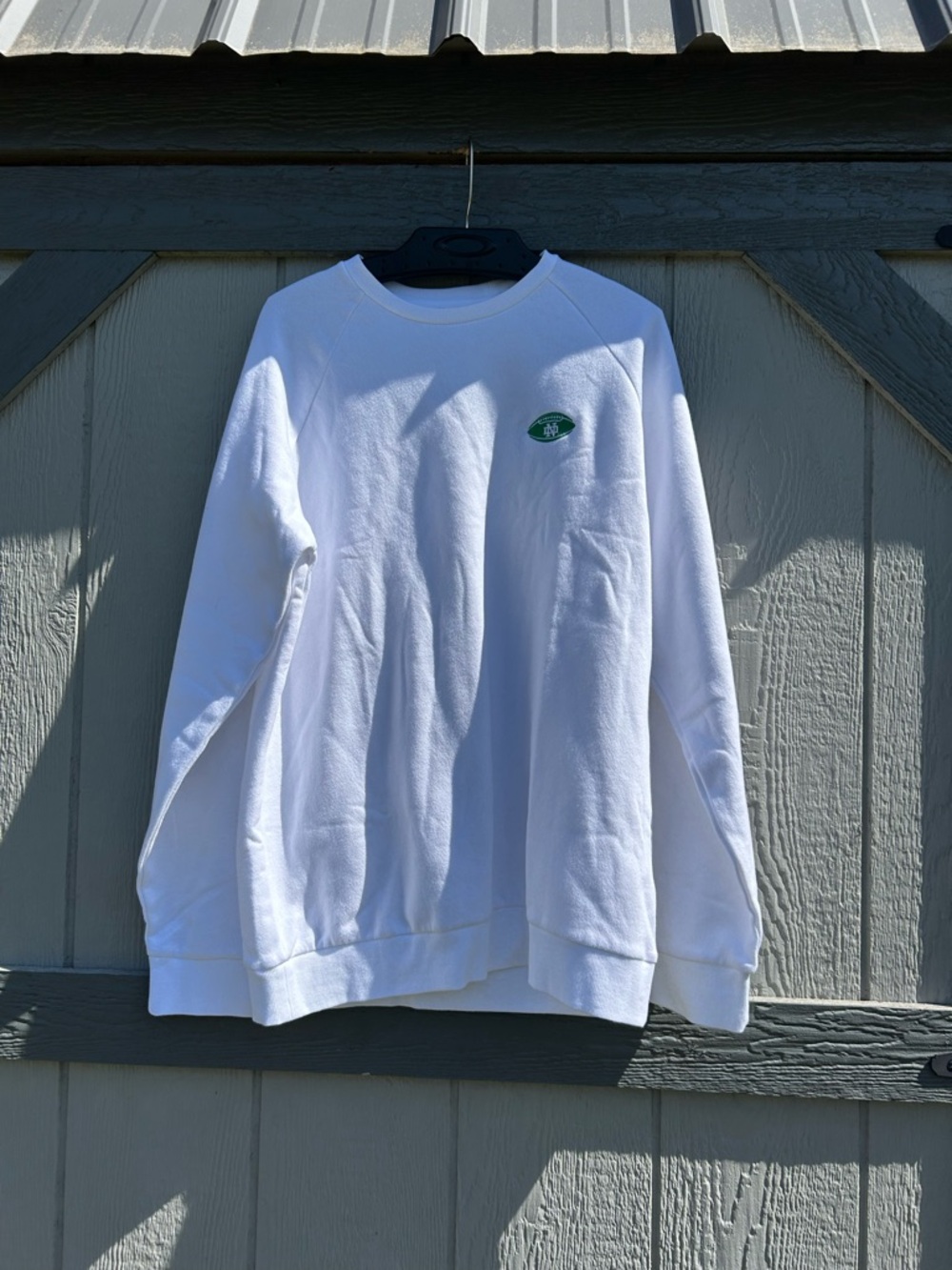 White Under Armour Sweatshirt with University of Notre Dame Green Logo